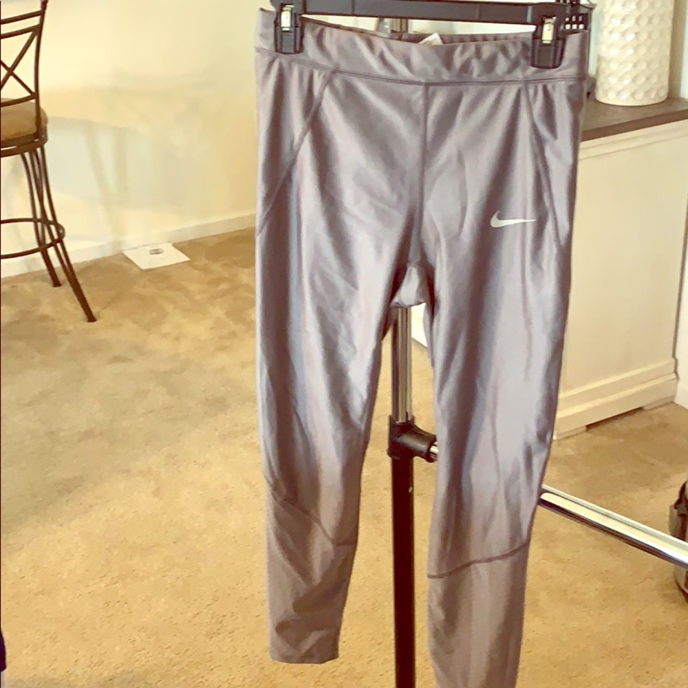 Platinum colored Nike leggings